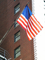 American Flag Outside Brick Building FREE Stock Photo, american flag, chicago, us flag picture