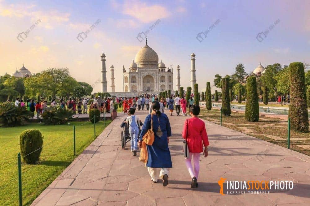Tourist sightseeing at Taj Mahal Agra at sunset