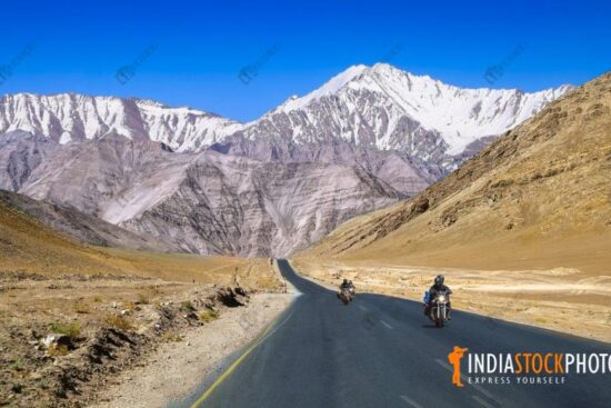 Bikers on Leh-Manali highway with scenic landscape at Ladakh