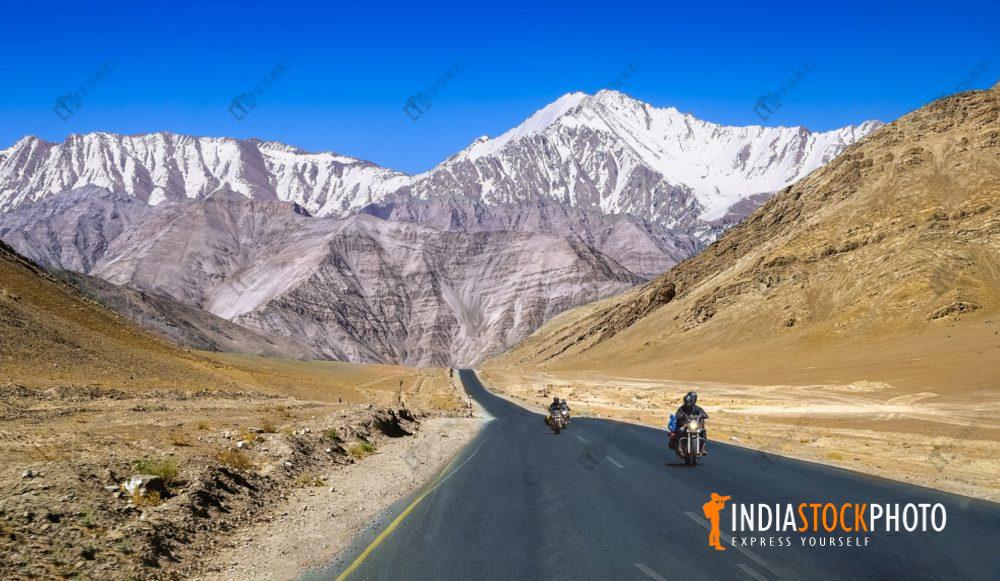 Bikers on Leh-Manali highway with scenic landscape at Ladakh