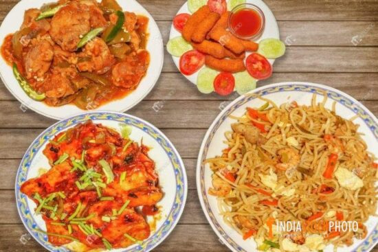 Indian food of spicy chicken chowmein with chilli chicken and red chilli fish