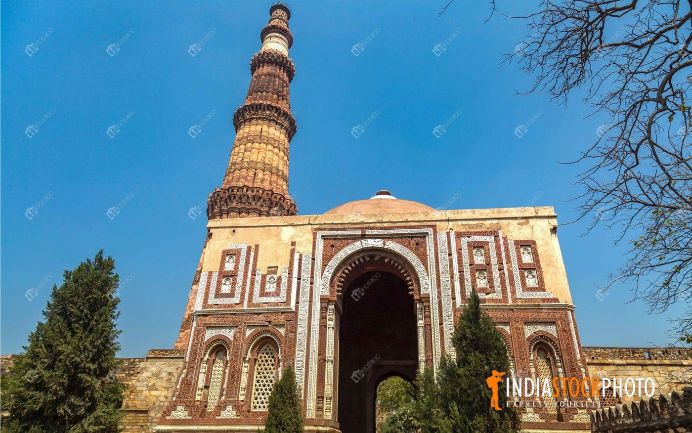 Qutub Minar monument with medieval ruins at Delhi