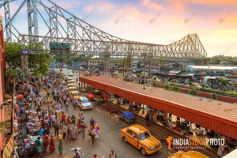 Aerial view of Howrah bridge with prepaid taxi stand at sunrise