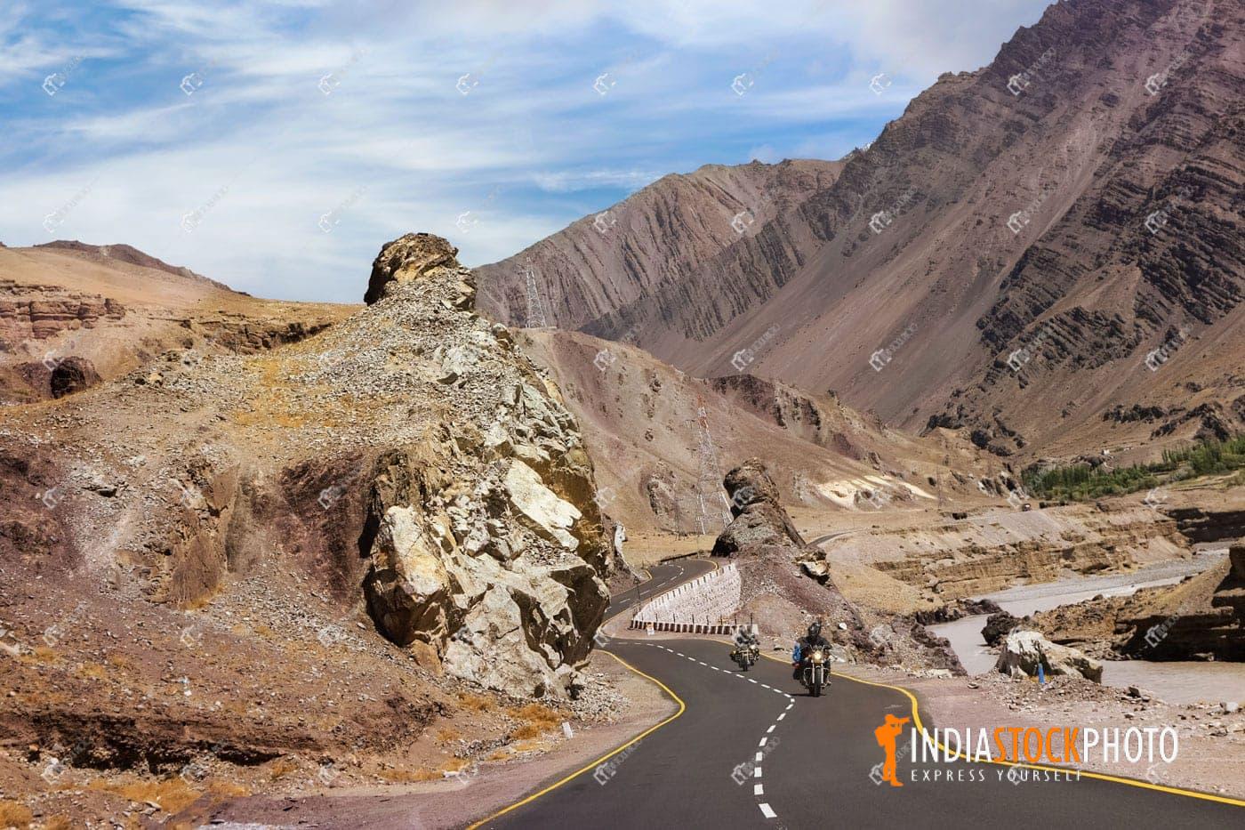 Ladakh landscape with Indian bikers on mountain highway