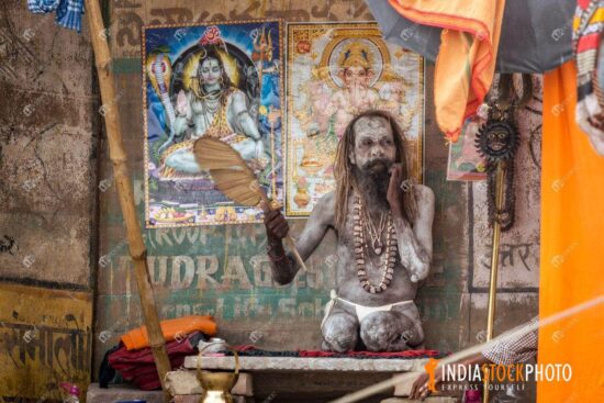 Indian sadhu smeared with bone ash at Varanasi