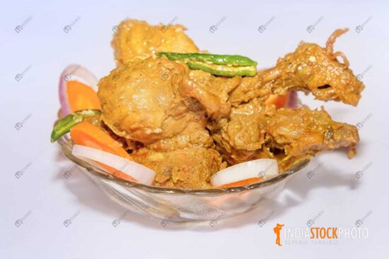 Spicy dry chicken masala cuisine served as side dish