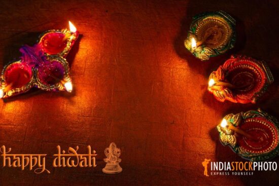 Diwali festival background with clay Diya lamps