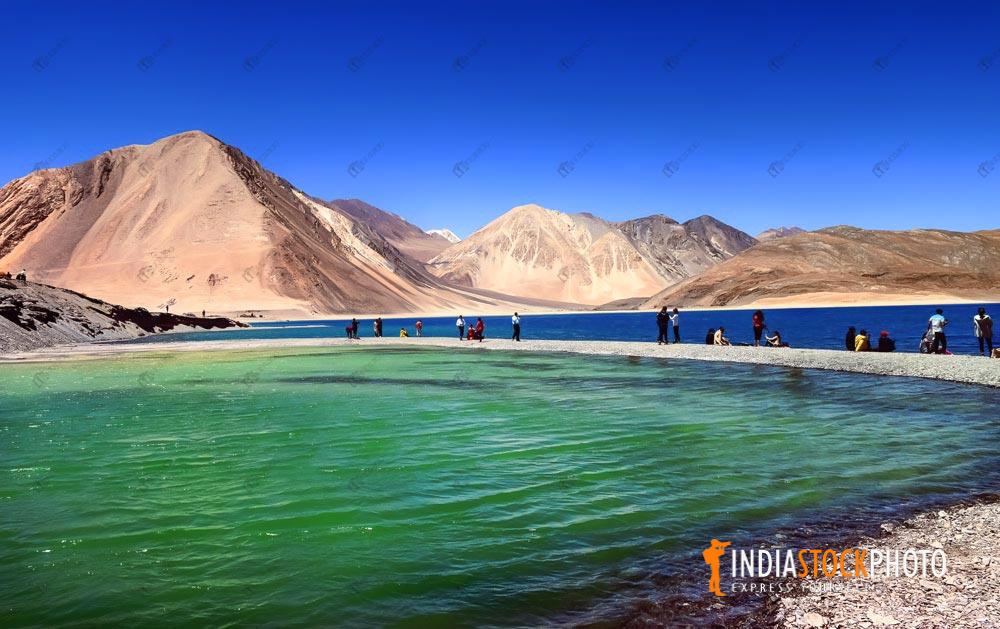 Scenic Pangong Lake Ladakh with tourists