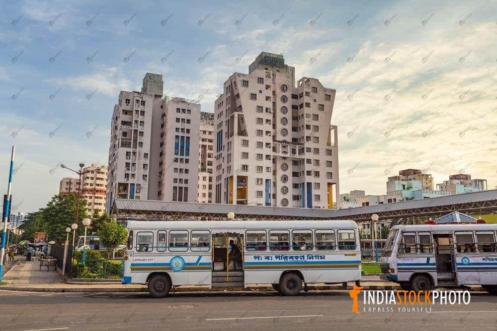 Public bus terminus with city residential building at Kolkata