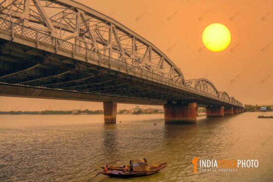 Suspension bridge at Bally over river Ganges at sunset