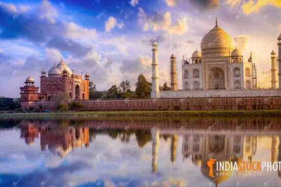 Taj Mahal Agra at sunset with vibrant sky and water reflection