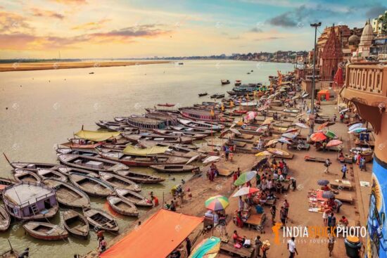 Varanasi Ganges river bank with wooden boats in aerial view