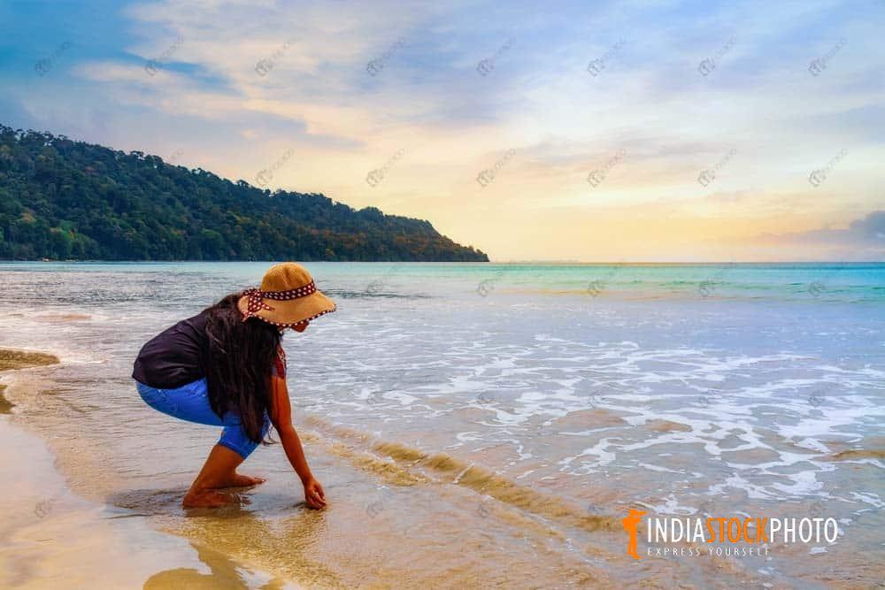 Female tourist at scenic Havelock island sea beach Andaman