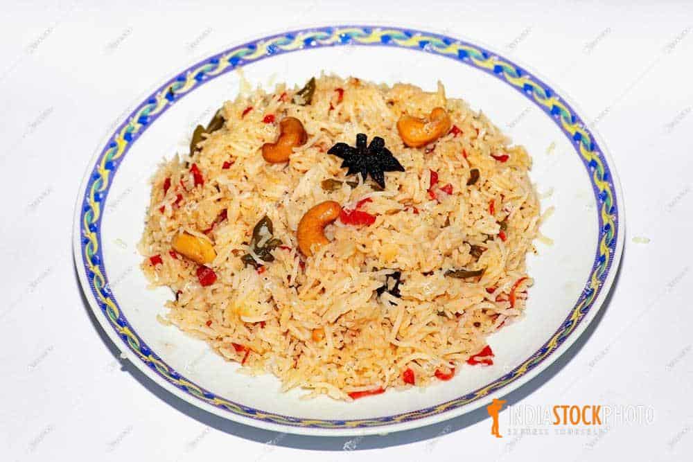Indian fried rice meal on white background