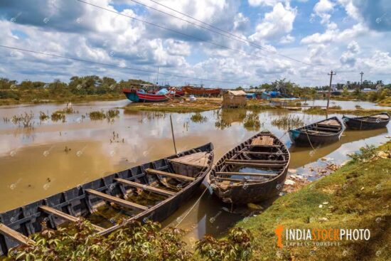 Rural Indian fishing village with boats and fishing trawlers