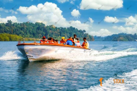 Tourist enjoy speed boat ride at Andaman sea India