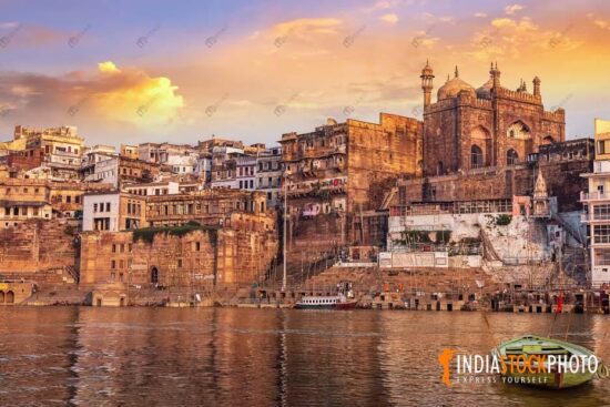 Varanasi ancient city architecture with river Ganges at sunset