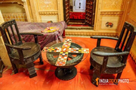 Ancient board game with old furniture at Patwon Ki Haveli heritage building at Jaisalmer