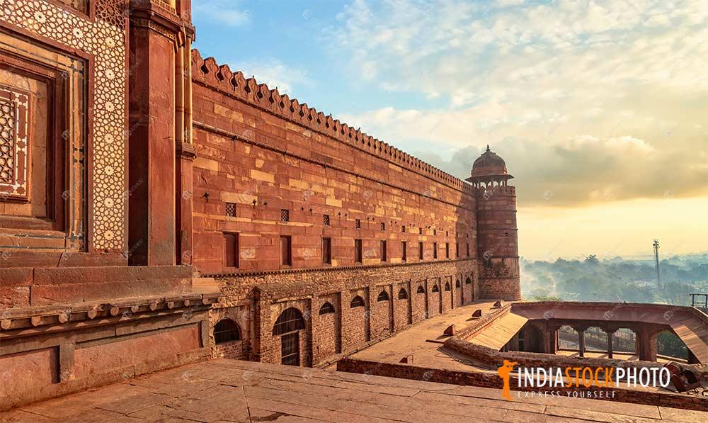Fort wall of Fatehpur Sikri Agra with cityscape at sunrise