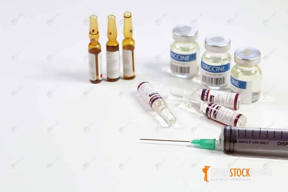 Medical syringe with vaccine bottles and injection vials