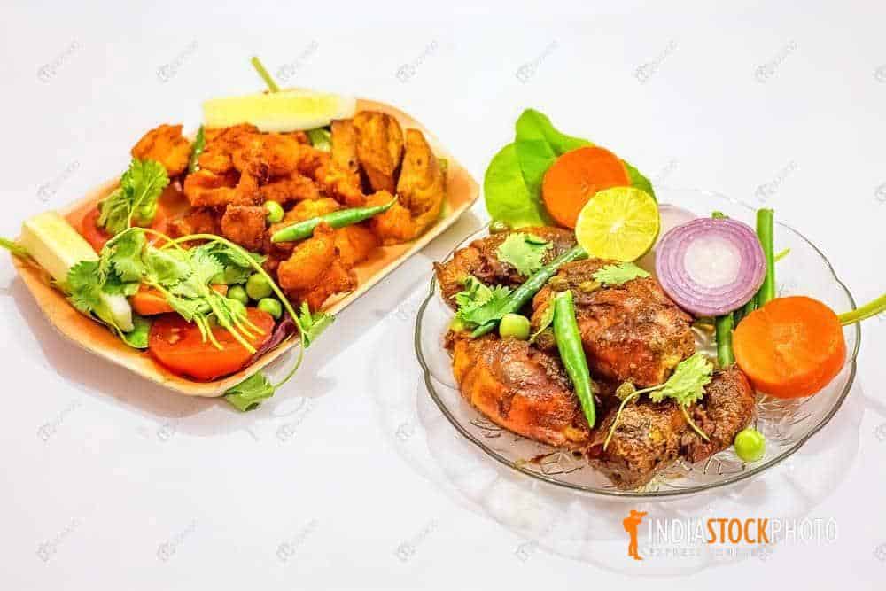 Indian food starters of crispy fried prawn with chicken pakora