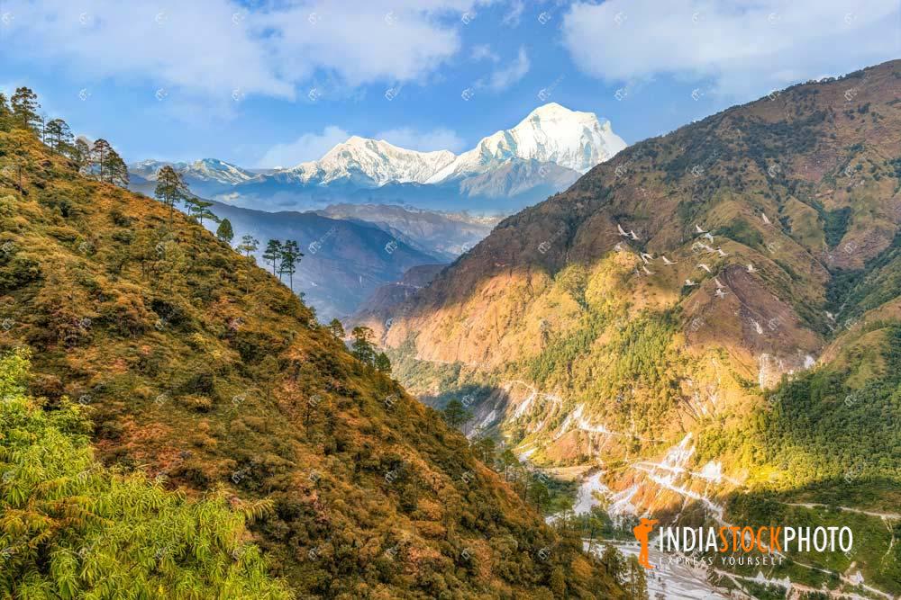 Mountain river valley with Himalaya snow peaks at Uttarakhand