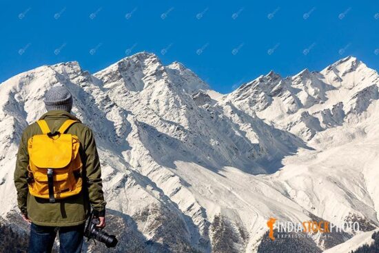 Tourist backpacker enjoy view of Himalaya range at Kaza Himachal Pradesh