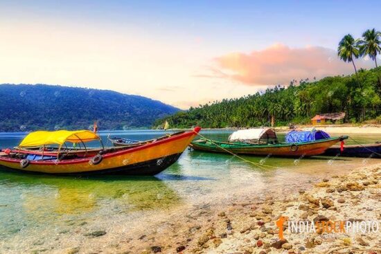 Wooden boats at North Bay island sea beach Andaman at sunset