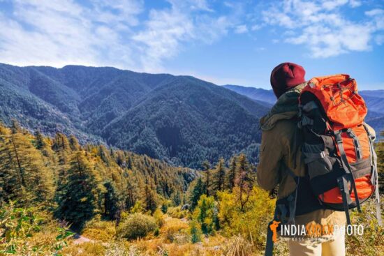 Tourist hiker at Sarahan Himachal Pradesh with scenic mountain landscape