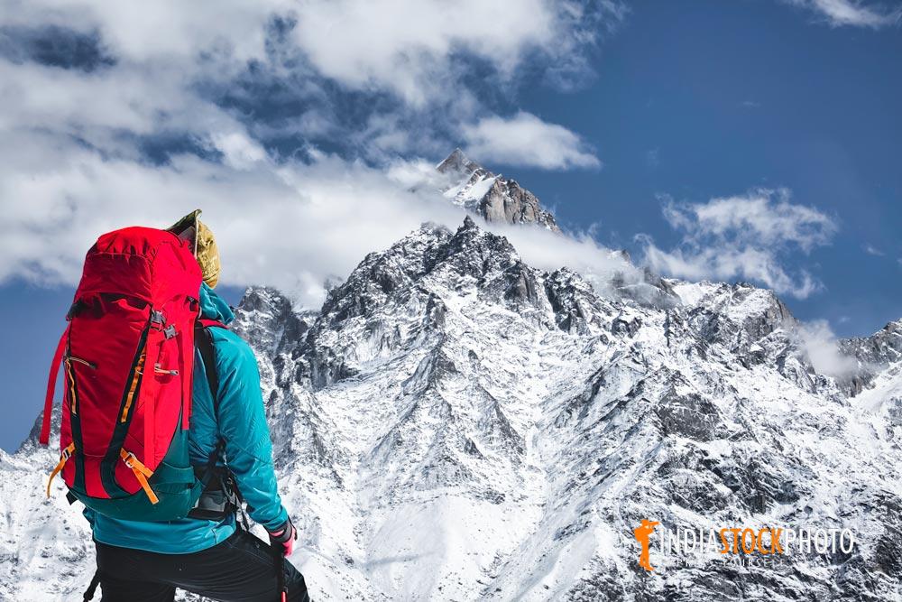 Tourist hiker on trek at Kailash Himalaya mountain range at Kaza Himachal Pradesh